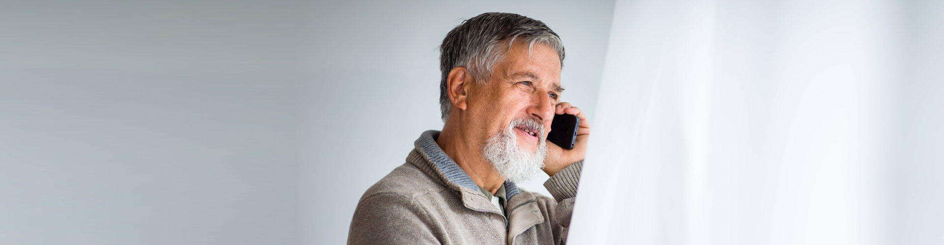 elderly man on the phone