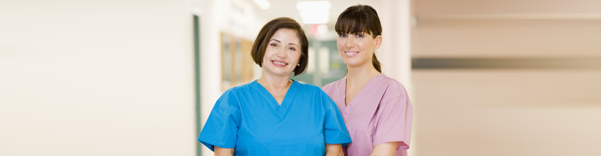 caregivers smiling at the camera